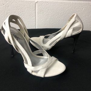 Splattered white heels